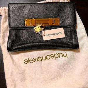 Alexis Hudson Black Leather Clutch ! New with tags! 7 in x 10 inches.
